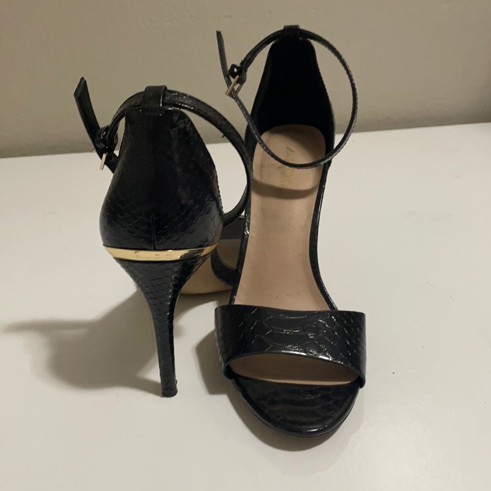 Aldos black snake print with gold accents